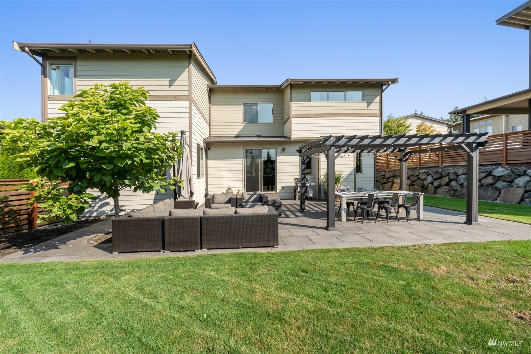 1413 South 28th Street Renton, WA 98055 - Photo 19 of 20 a view of a house with backyard and sitting area