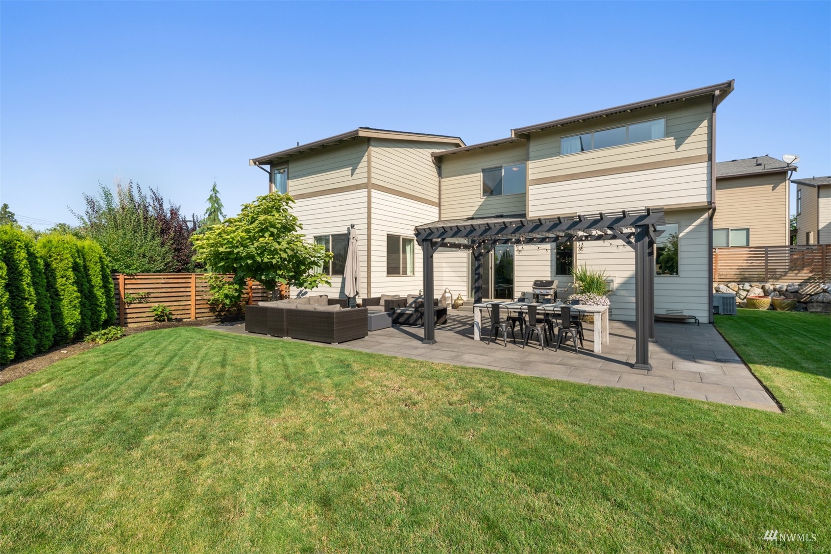 1413 South 28th Street Renton, WA 98055 - Photo 20 of 20 a view of a house with backyard porch and sitting area