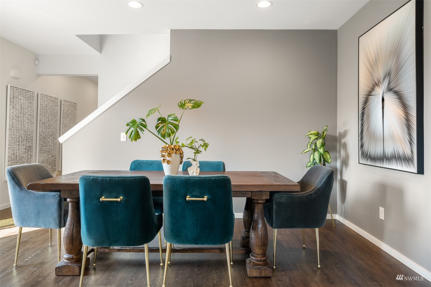 1413 South 28th Street Renton, WA 98055 - Photo 7 of 20 a view of a dining room with furniture and a potted plant