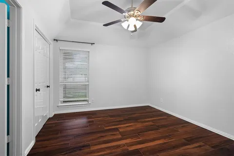 a bathroom with a sink toilet a mirror and shower