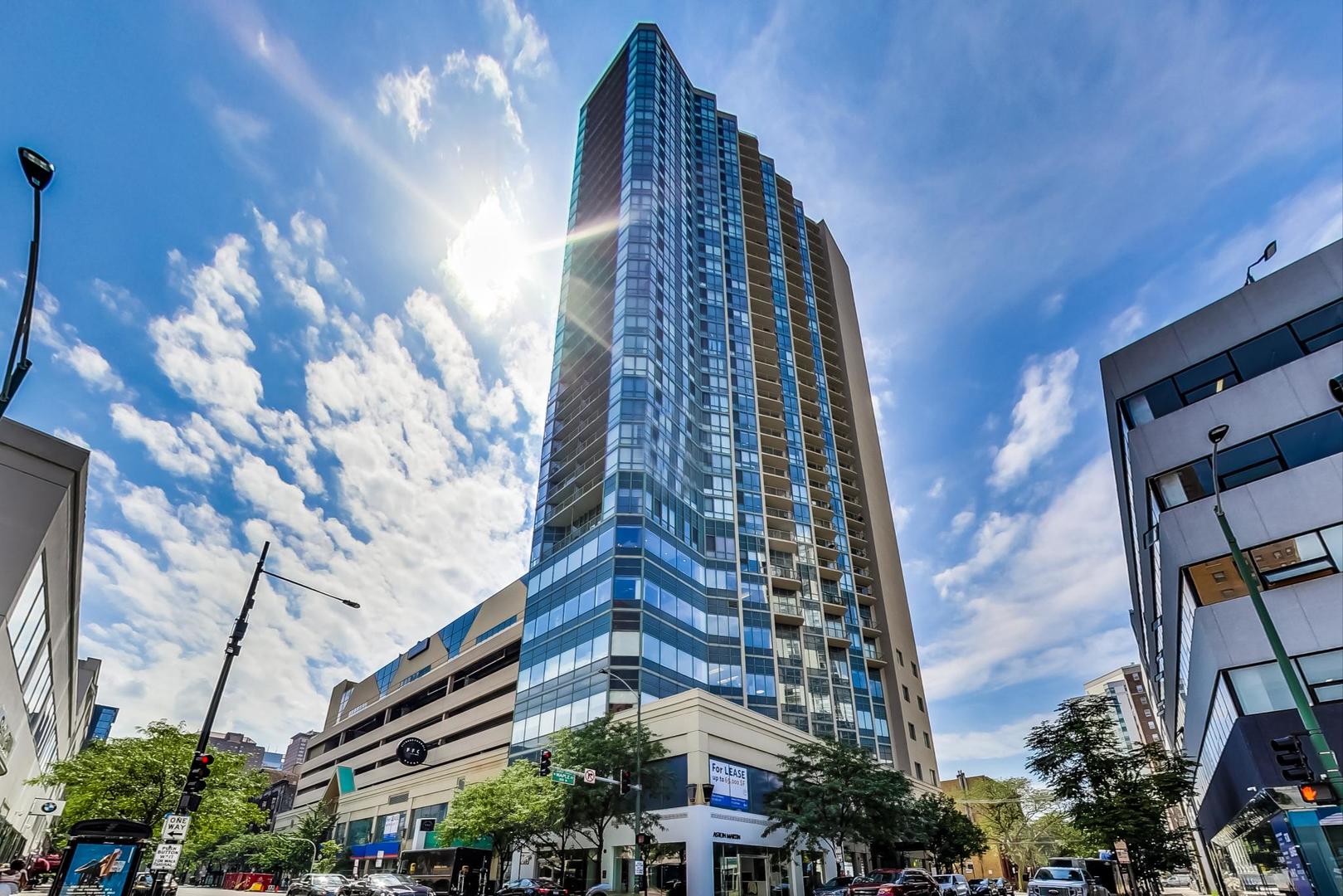 111 West Maple Street, Unit 1410 Chicago, IL 60610 - Photo 4 of 41 a view of a multi story building