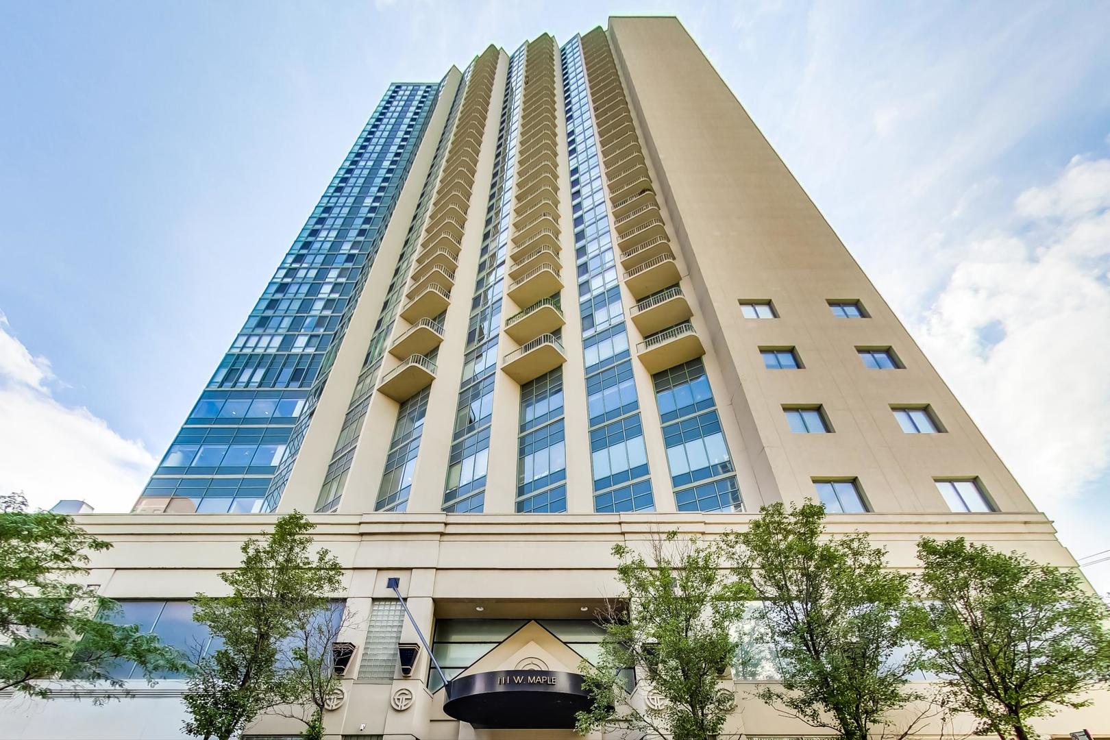 111 West Maple Street, Unit 1410 Chicago, IL 60610 - Photo 7 of 41 a view of a tall building