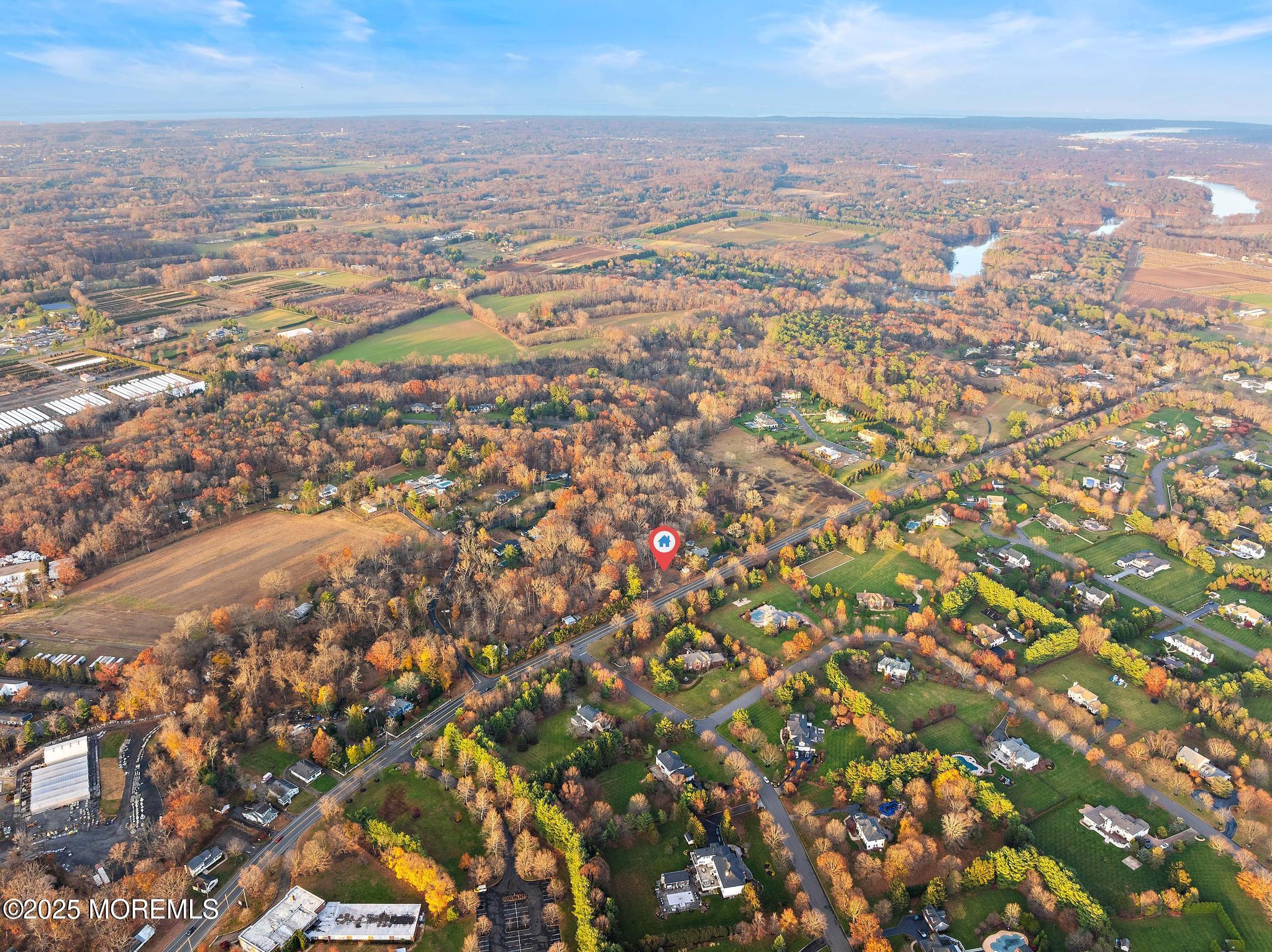 233-237 County Road 537 Colts Neck, NJ 07722 - Photo 6 of 7 an aerial view of residential houses with outdoor space