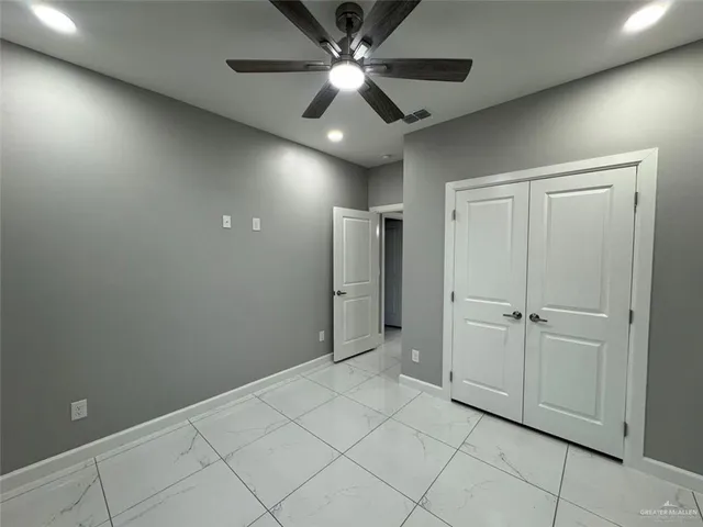 a bathroom with a sink toilet and mirror