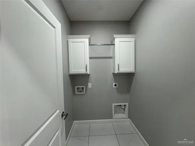 a front view of a house with a yard and porch