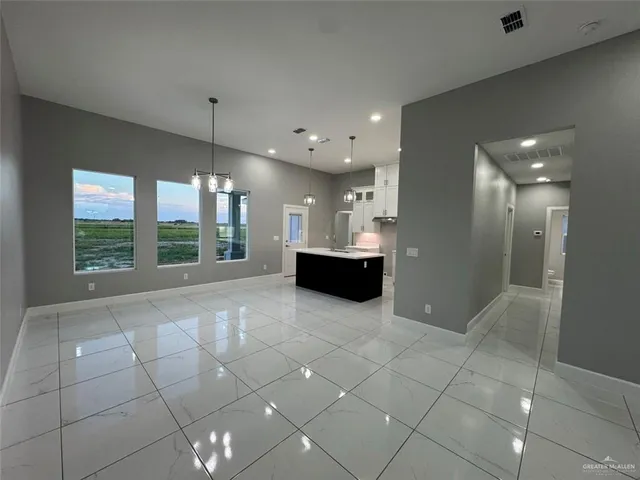 a bathroom with a sink a mirror and a shower