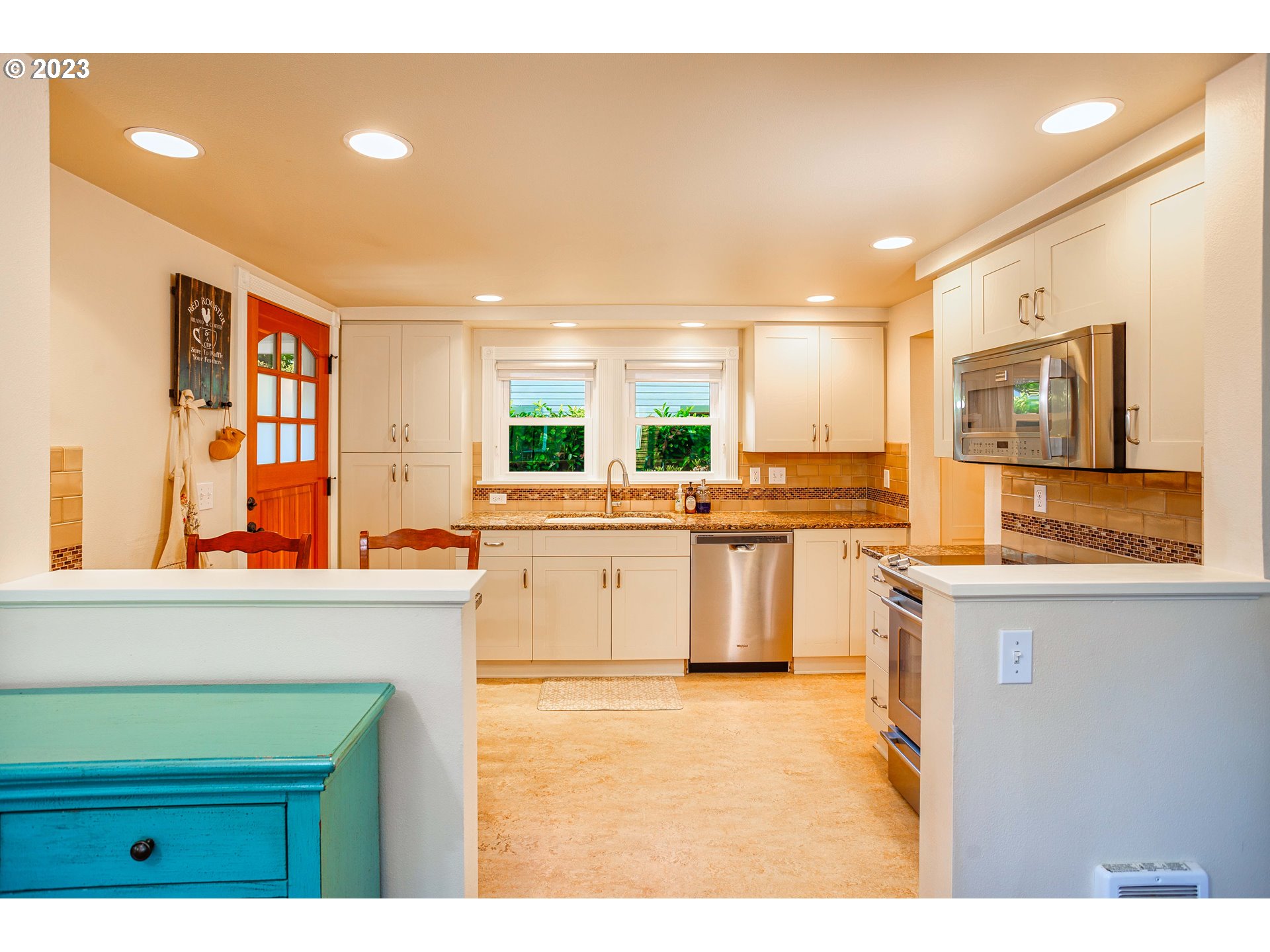 210 South 4th Avenue Ridgefield, WA 98642 - Photo 11 of 31 a kitchen with a sink cabinets and window
