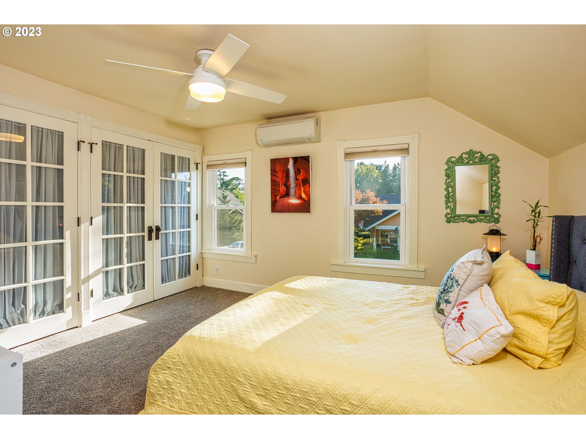 210 South 4th Avenue Ridgefield, WA 98642 - Photo 17 of 31 a bedroom with a bed and a large window