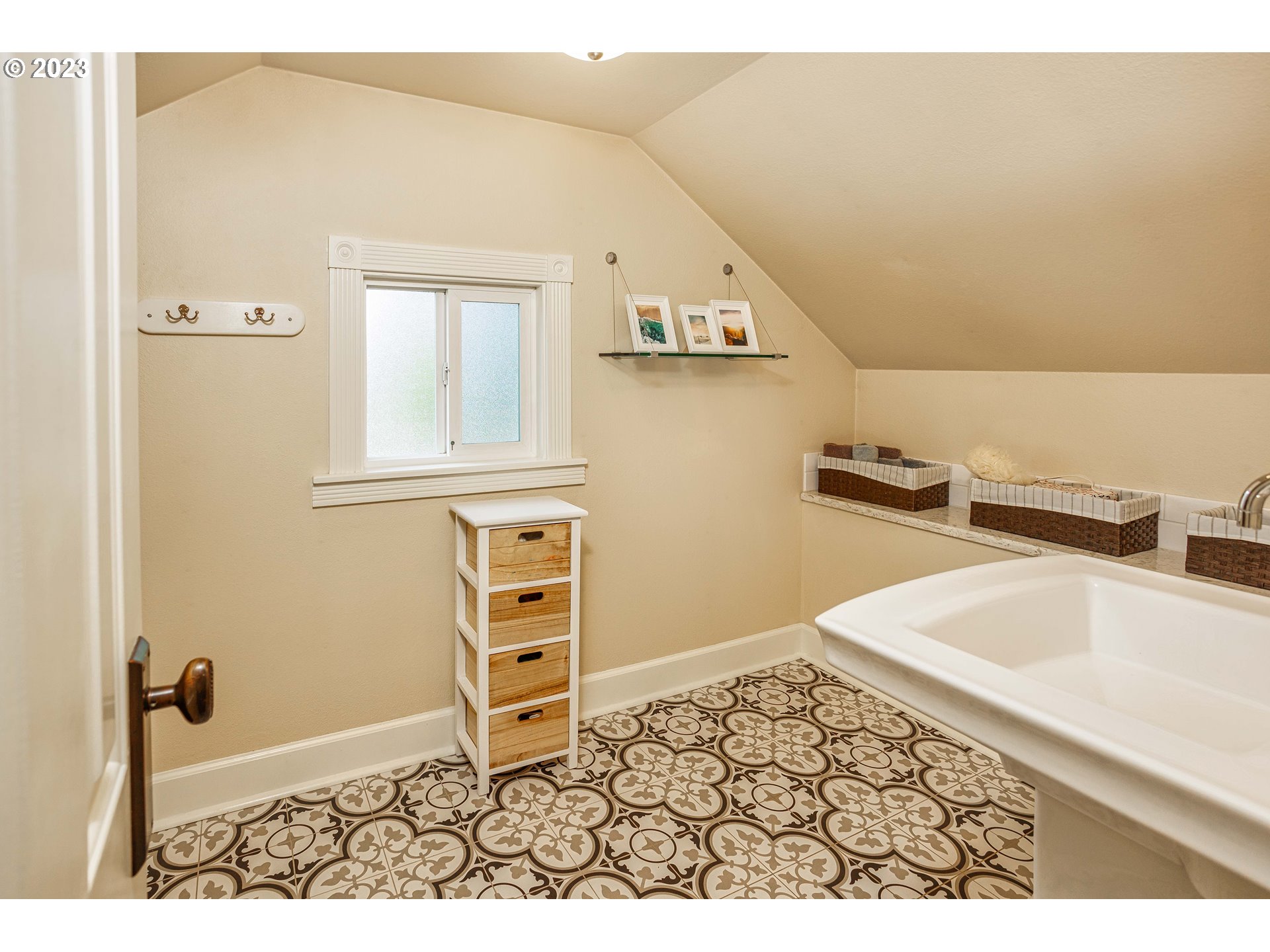210 South 4th Avenue Ridgefield, WA 98642 - Photo 18 of 31 a bathroom with a sink and a mirror