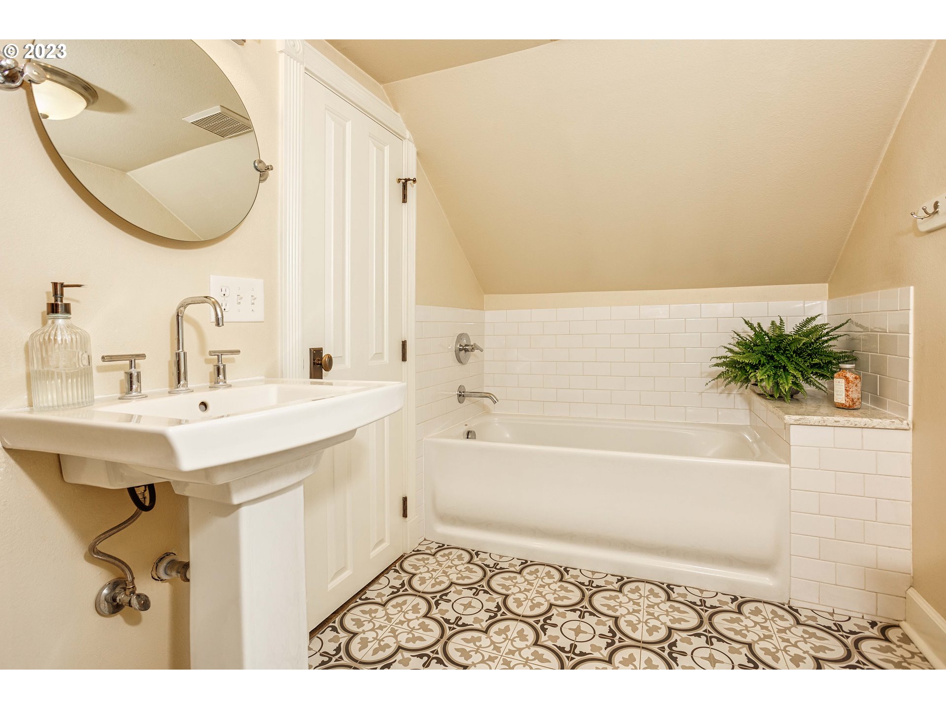 210 South 4th Avenue Ridgefield, WA 98642 - Photo 19 of 31 a bathroom with a sink and a mirror