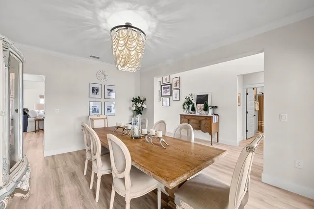 a kitchen with a sink appliances and a window