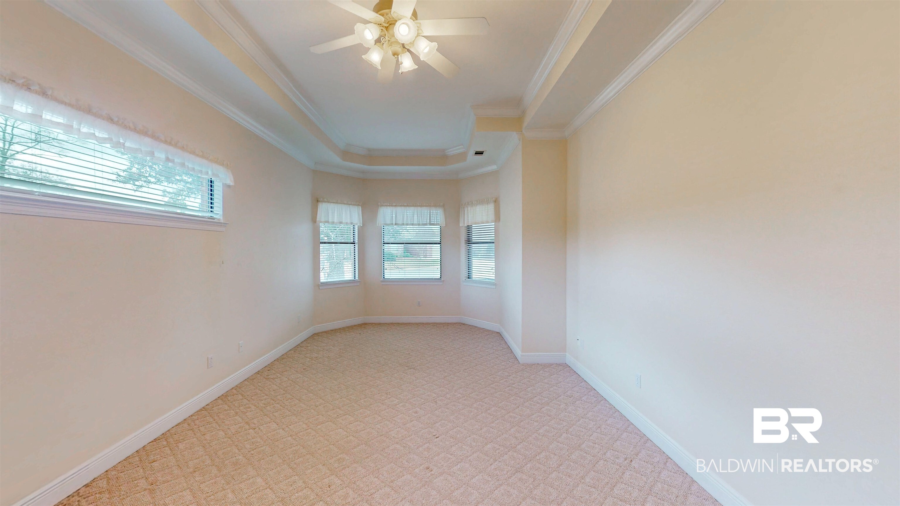 214 Hemingway Loop Foley, AL 36535 - Photo 24 of 67 Spare room featuring ornamental molding and ceiling fan