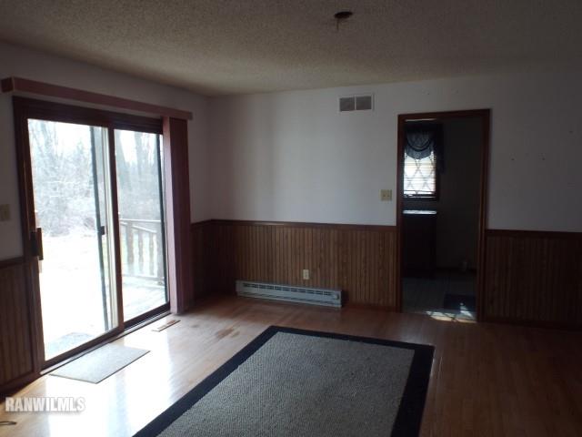 5299 West Nobis Road Hanover, IL 61041 - Photo 8 of 24 an empty room with windows