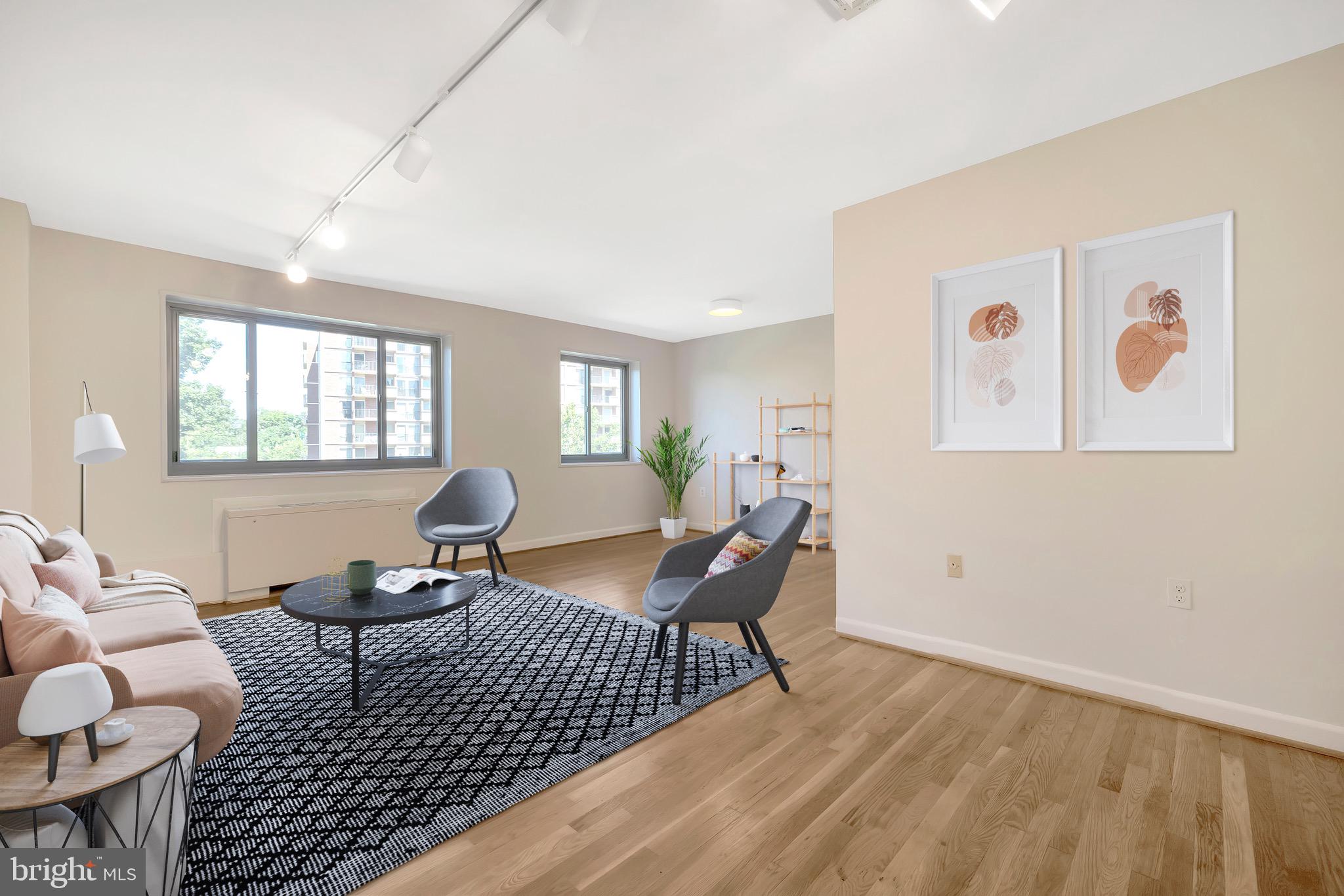 1200 South Arlington Ridge Road, Unit 503 Arlington, VA 22202 - Photo 7 of 17 a living room with furniture a window and a table