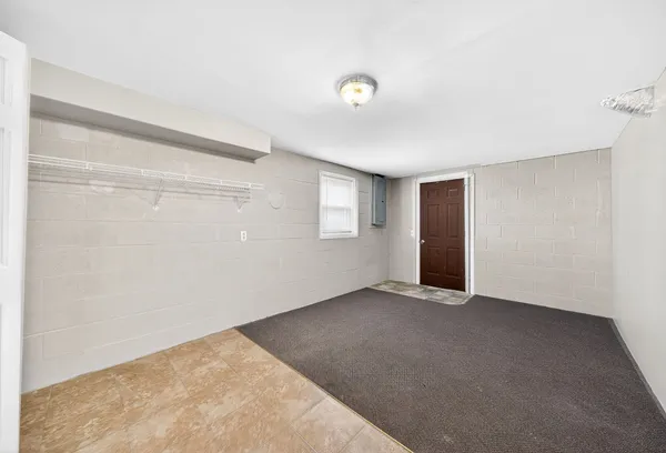 a view of a bathroom with a glass door shower
