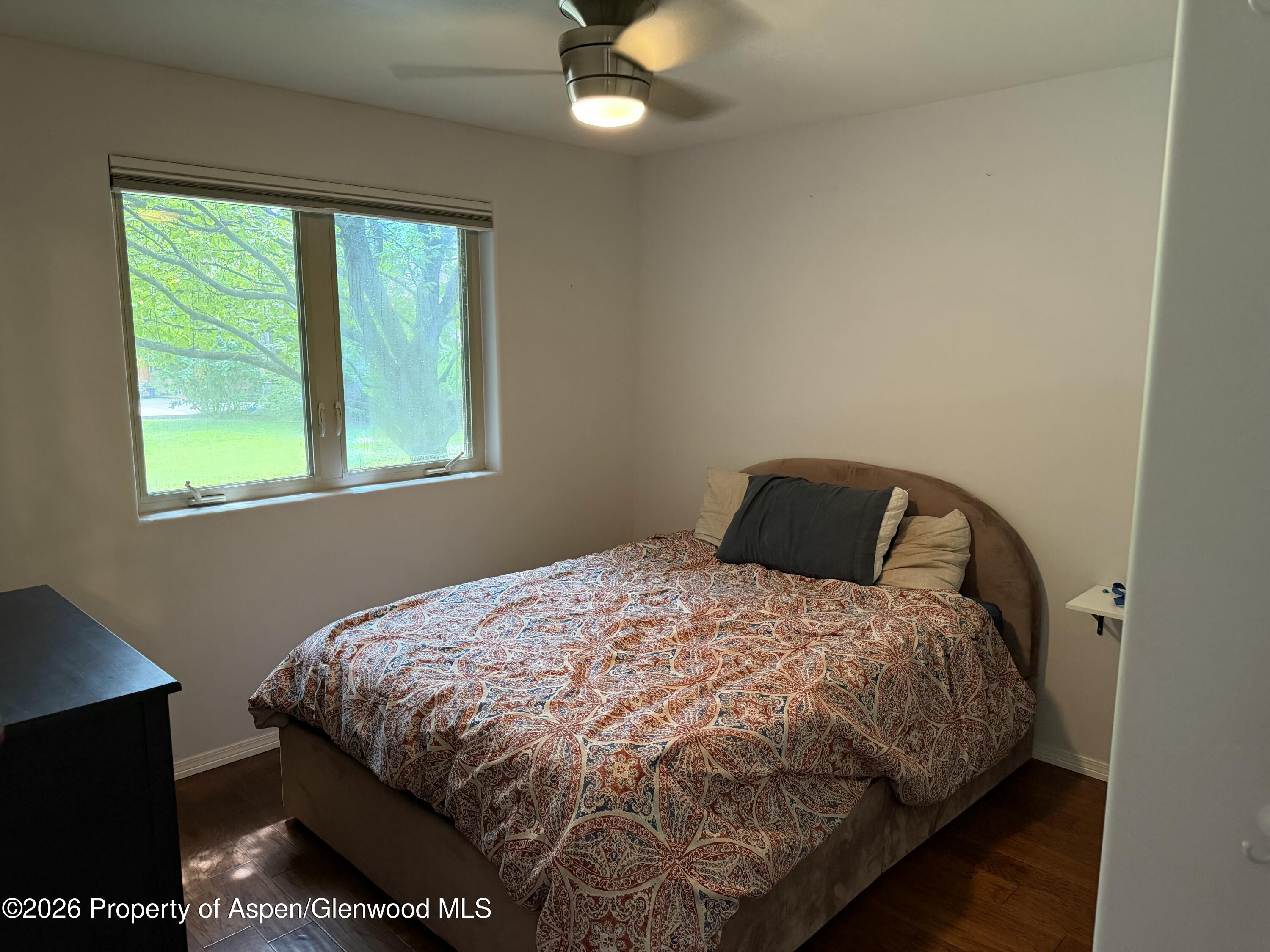 1400 East Valley Road, Unit 2 Basalt, CO 81621 - Photo 6 of 6 a bedroom with a bed and window