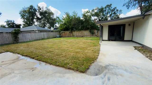 a house with swimming pool in front of it