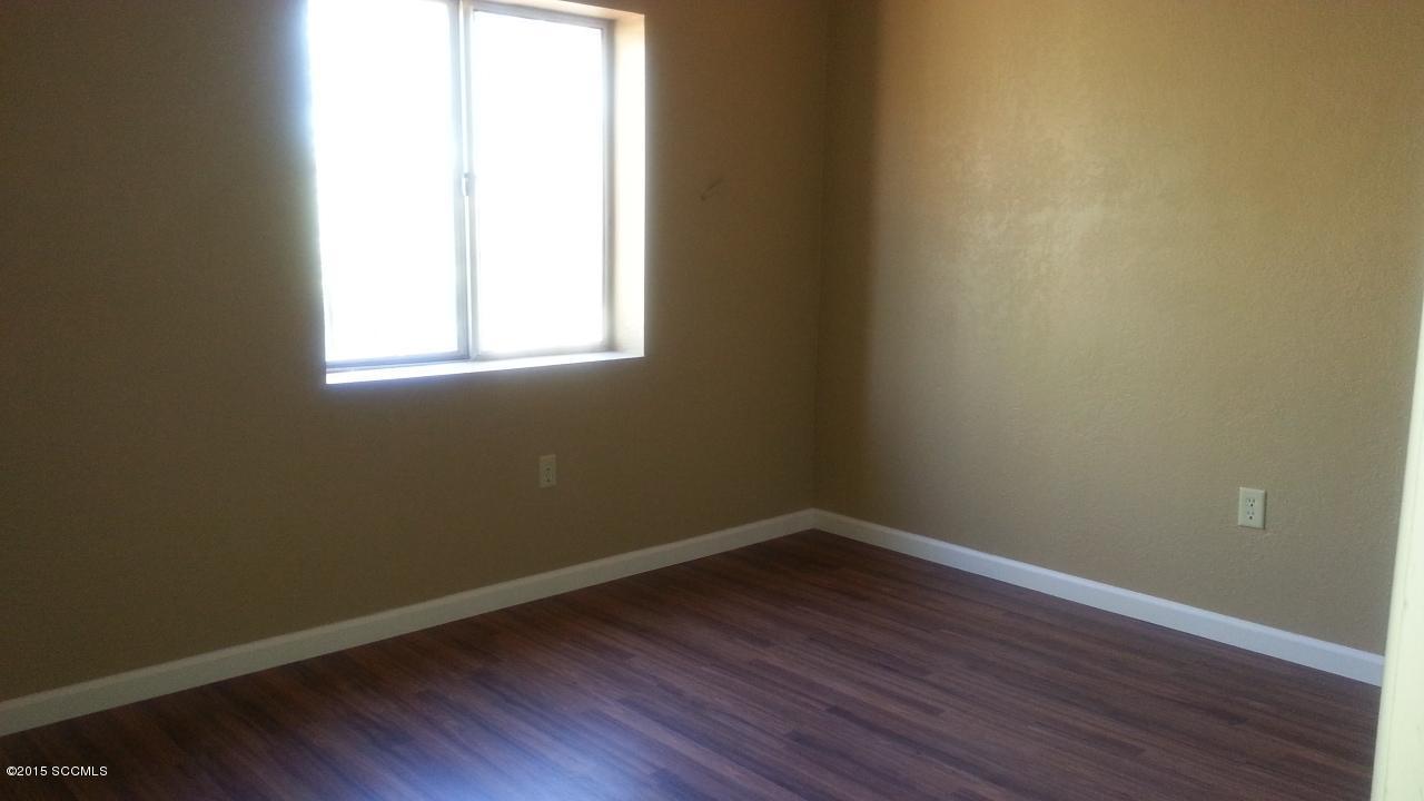 430 Paseo Flamenco Rio Rico, AZ 85648 - Photo 4 of 11 a view of a small space with wooden floor and a window