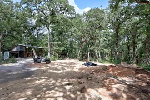 a house view with a backyard space