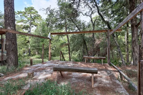 a view of a backyard of the house