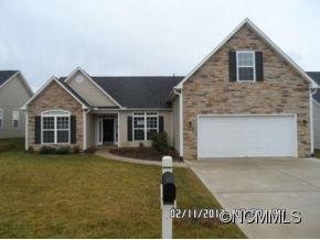 83 West Hiawassee Road Fletcher, NC 28732 - Photo 1 of 2 a front view of a house with a yard