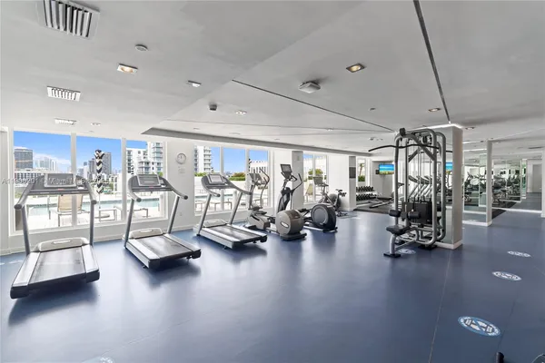 a view of a room with gym equipment