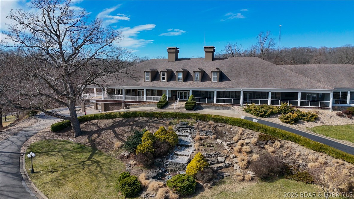 100 Osage Hills Road, Unit 504 Lake Ozark, MO 65049 - Photo 43 of 55 Clubhouse has dining options, bar, and pro shop