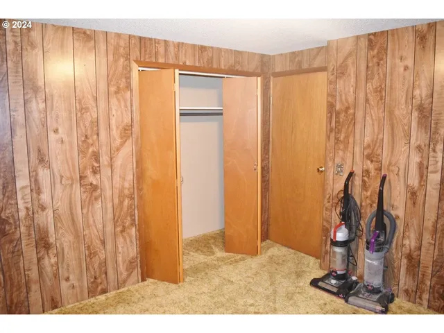 a view of a bathroom with a shower curtain