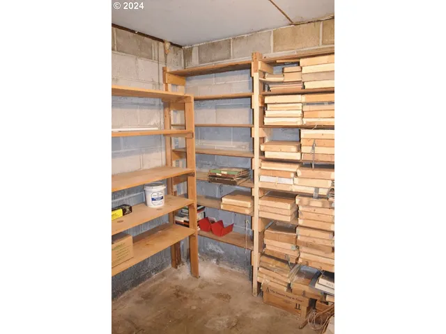 a room with lots of tables and chairs