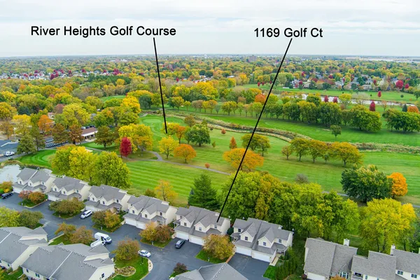 a hallway with a sink and a mirror