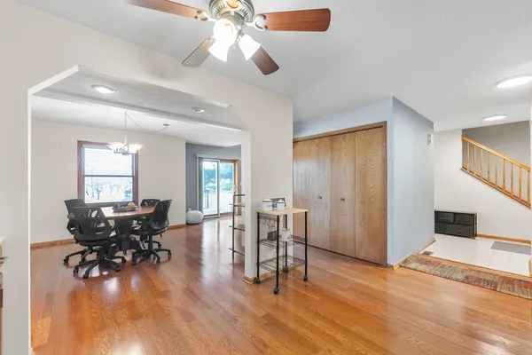 a view of a dining room with furniture window and wooden floor