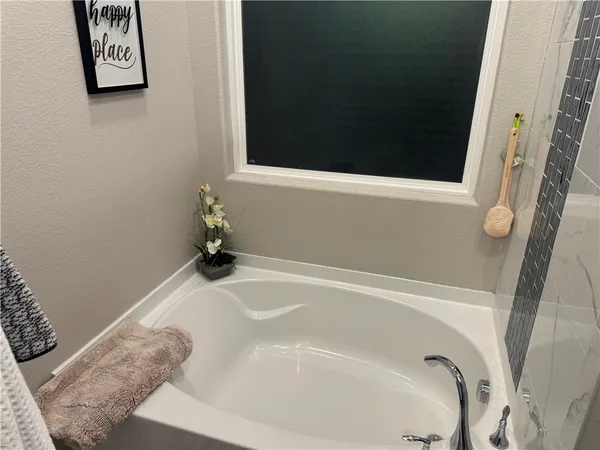 a bathroom with a bathtub