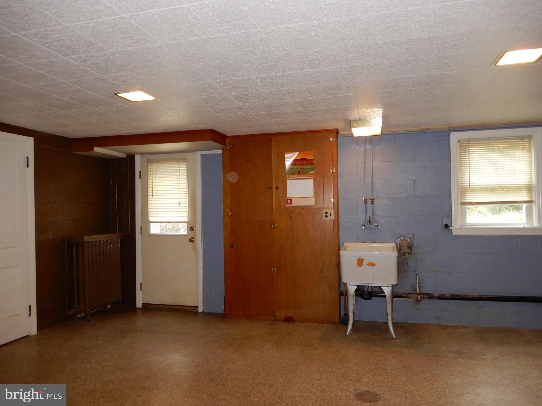 733 Clearmount Road York, PA 17403 - Photo 18 of 18 Laundry Hook-ups and door to Backyard