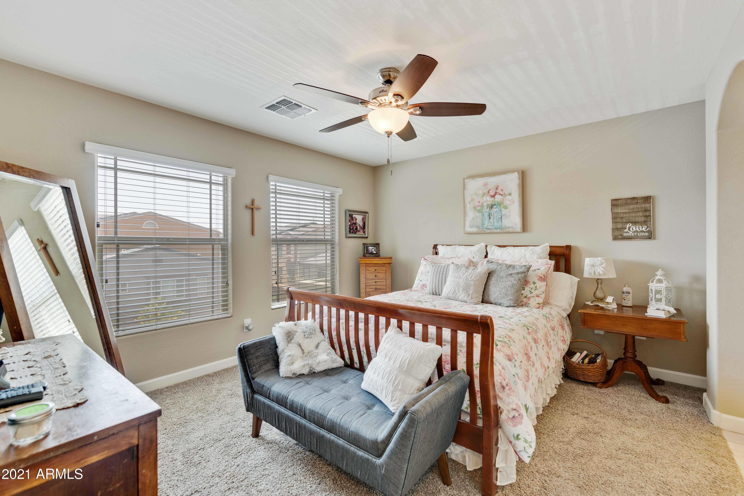 2150 West Alameda Road, Unit 1093 Phoenix, AZ 85085 - Photo 14 of 35 a living room with furniture and a window