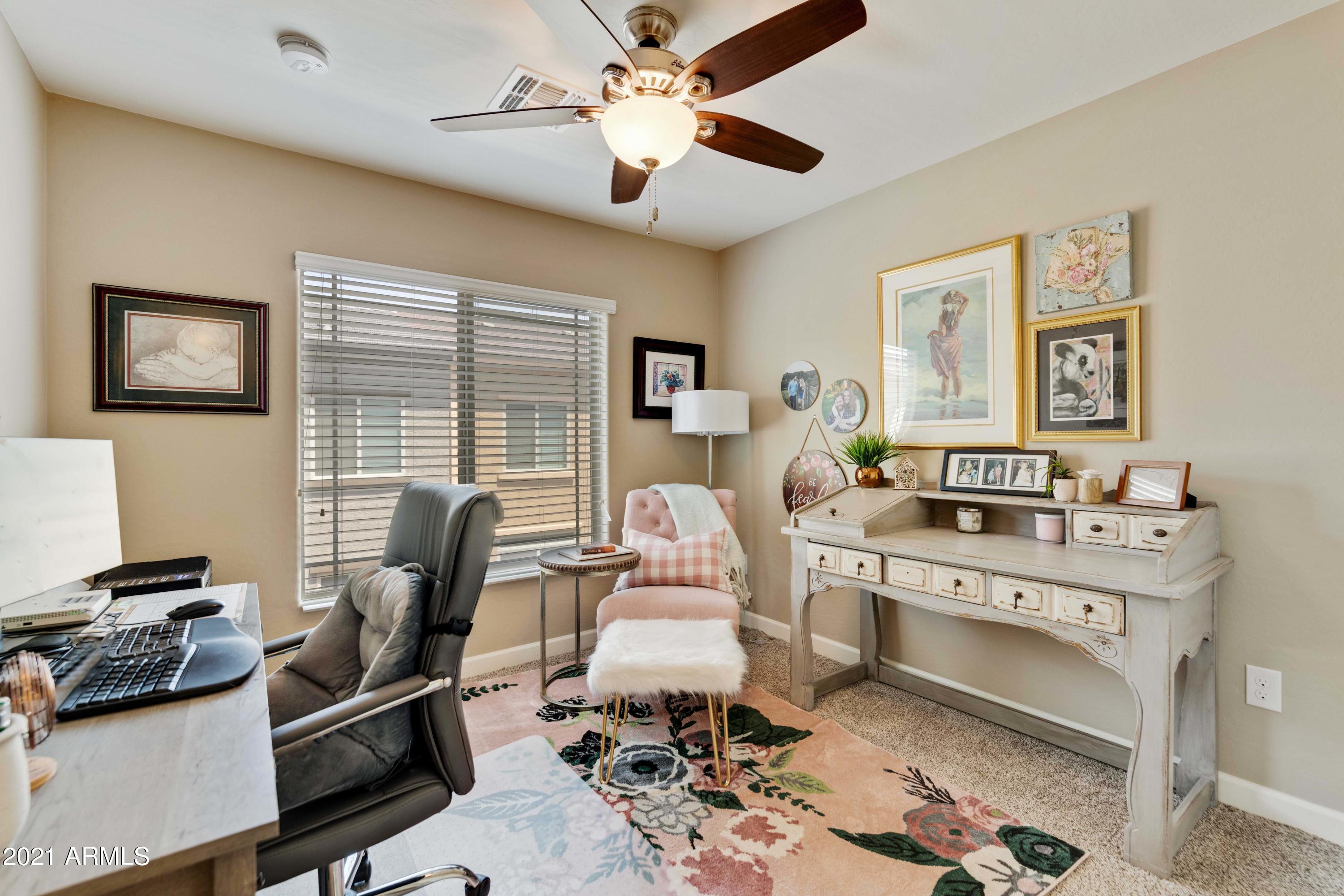 2150 West Alameda Road, Unit 1093 Phoenix, AZ 85085 - Photo 23 of 35 a view of a workspace with furniture and a window