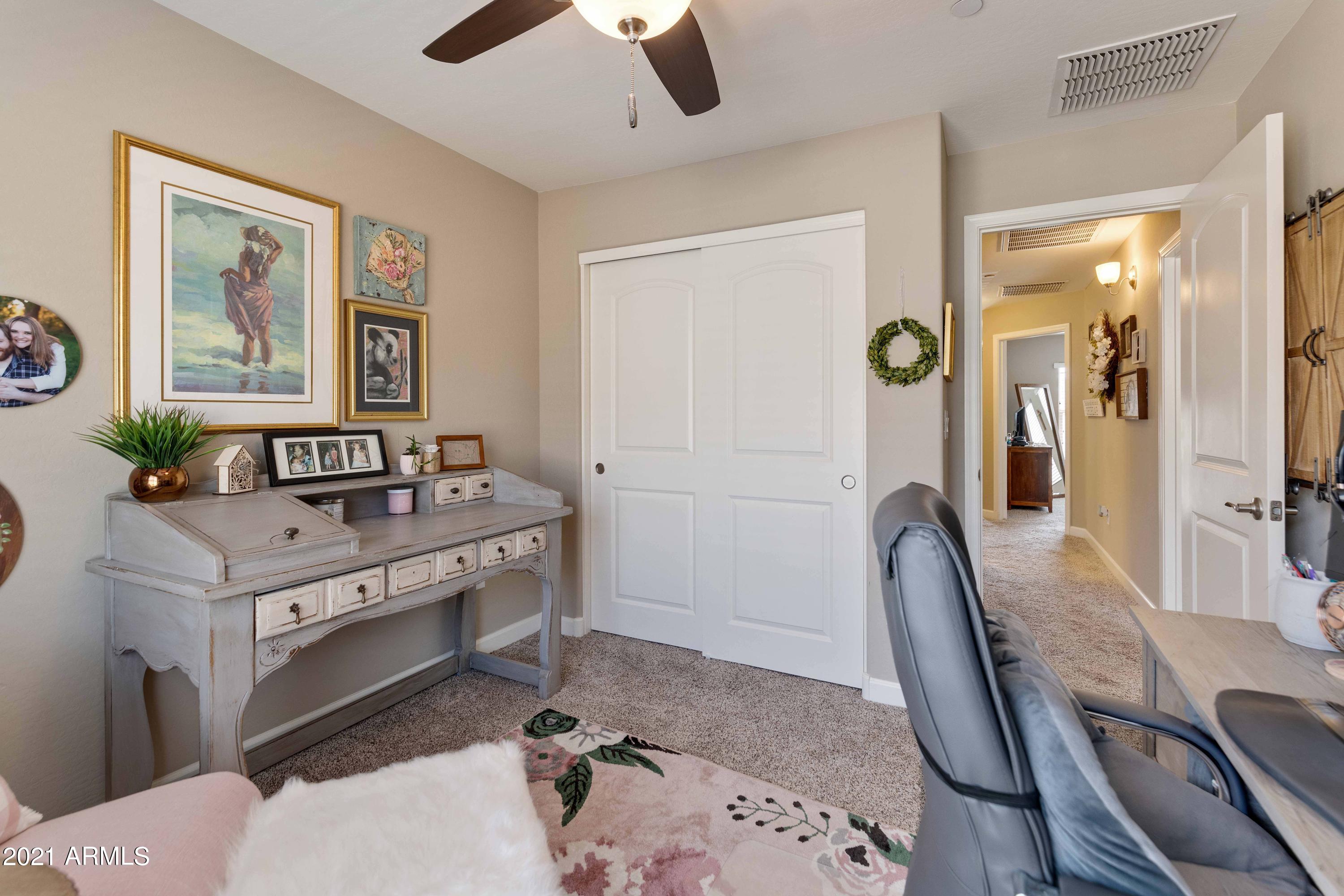 2150 West Alameda Road, Unit 1093 Phoenix, AZ 85085 - Photo 24 of 35 a view of a livingroom with furniture and window