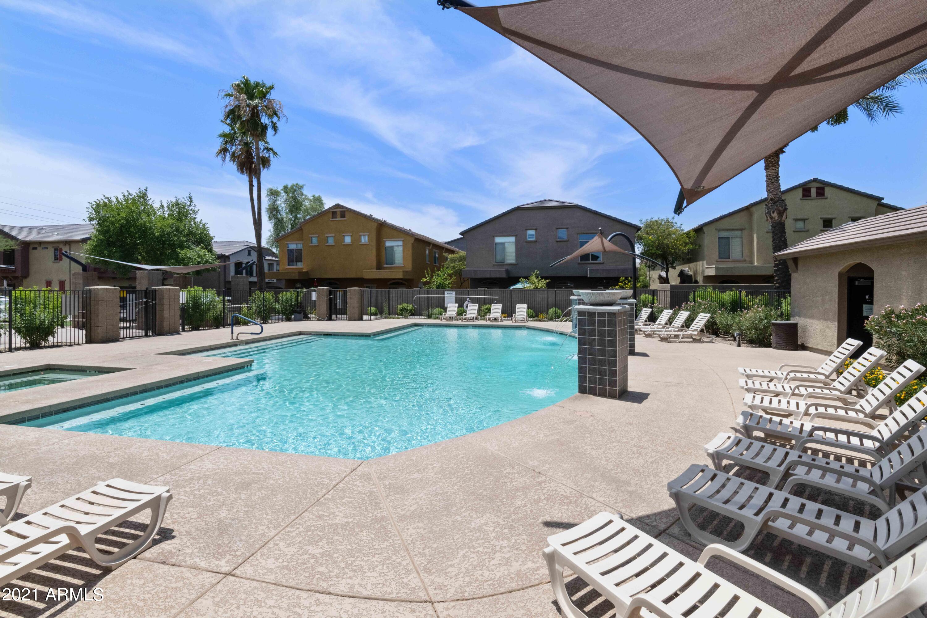 2150 West Alameda Road, Unit 1093 Phoenix, AZ 85085 - Photo 30 of 35 a view of a house with a patio