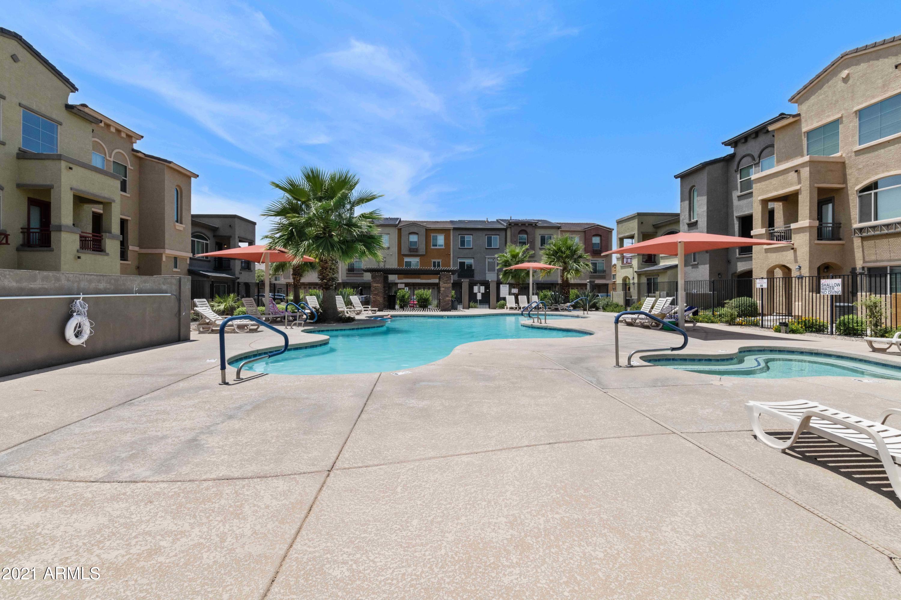 2150 West Alameda Road, Unit 1093 Phoenix, AZ 85085 - Photo 33 of 35 a sign board with buildings in the background