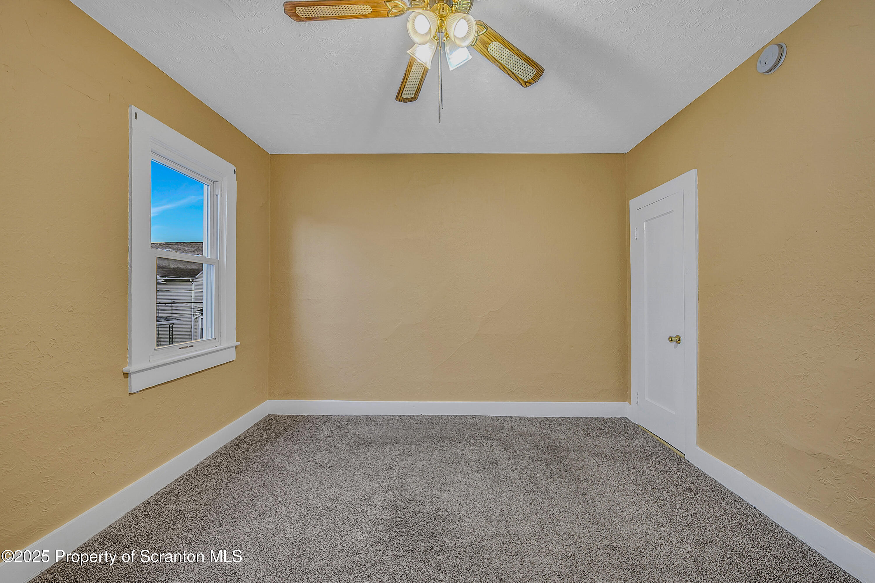 924 Snyder Avenue Scranton, PA 18504 - Photo 16 of 28 a view of an empty room with a window