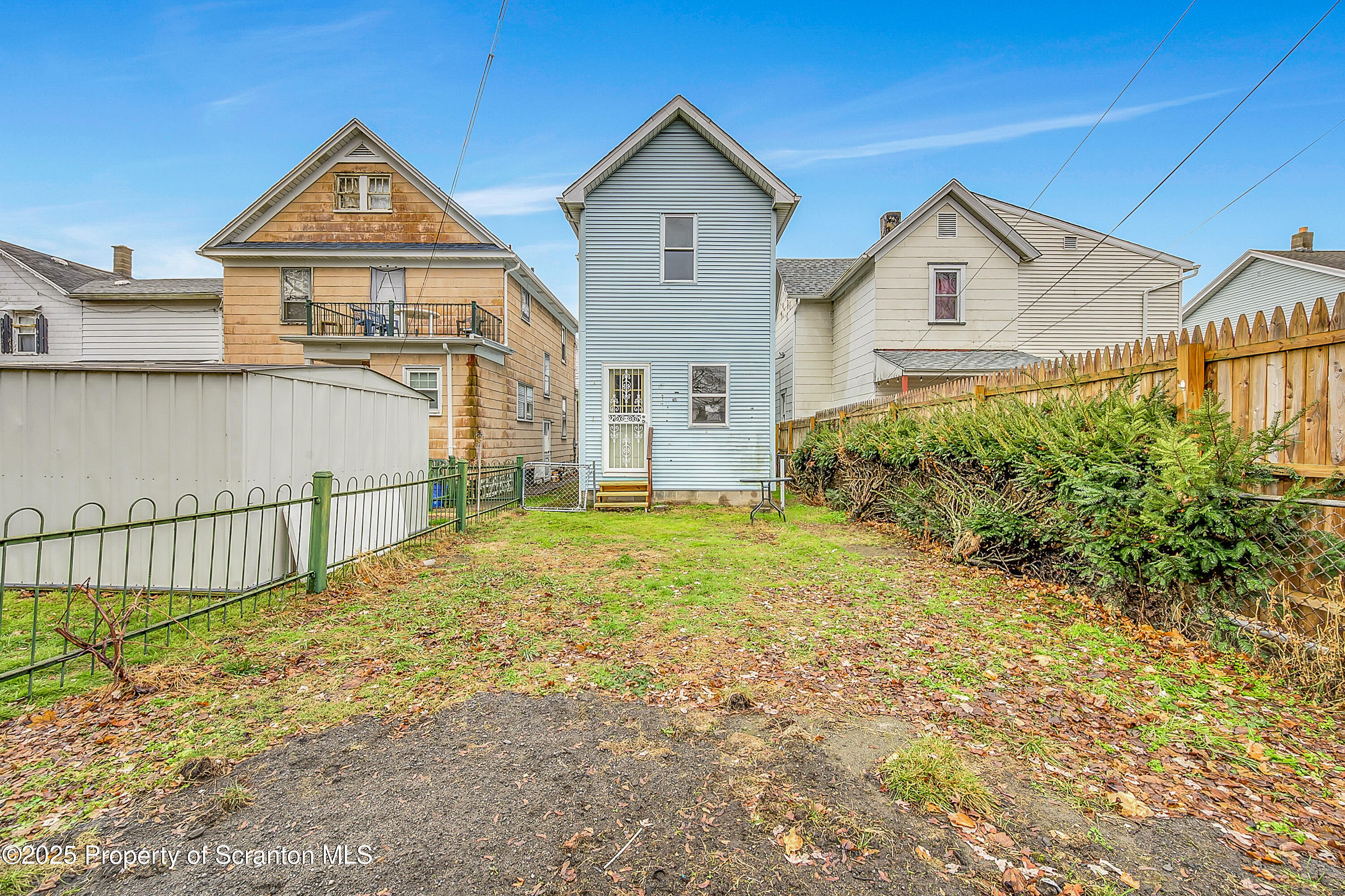 924 Snyder Avenue Scranton, PA 18504 - Photo 5 of 28 a view of a big house with wooden fence