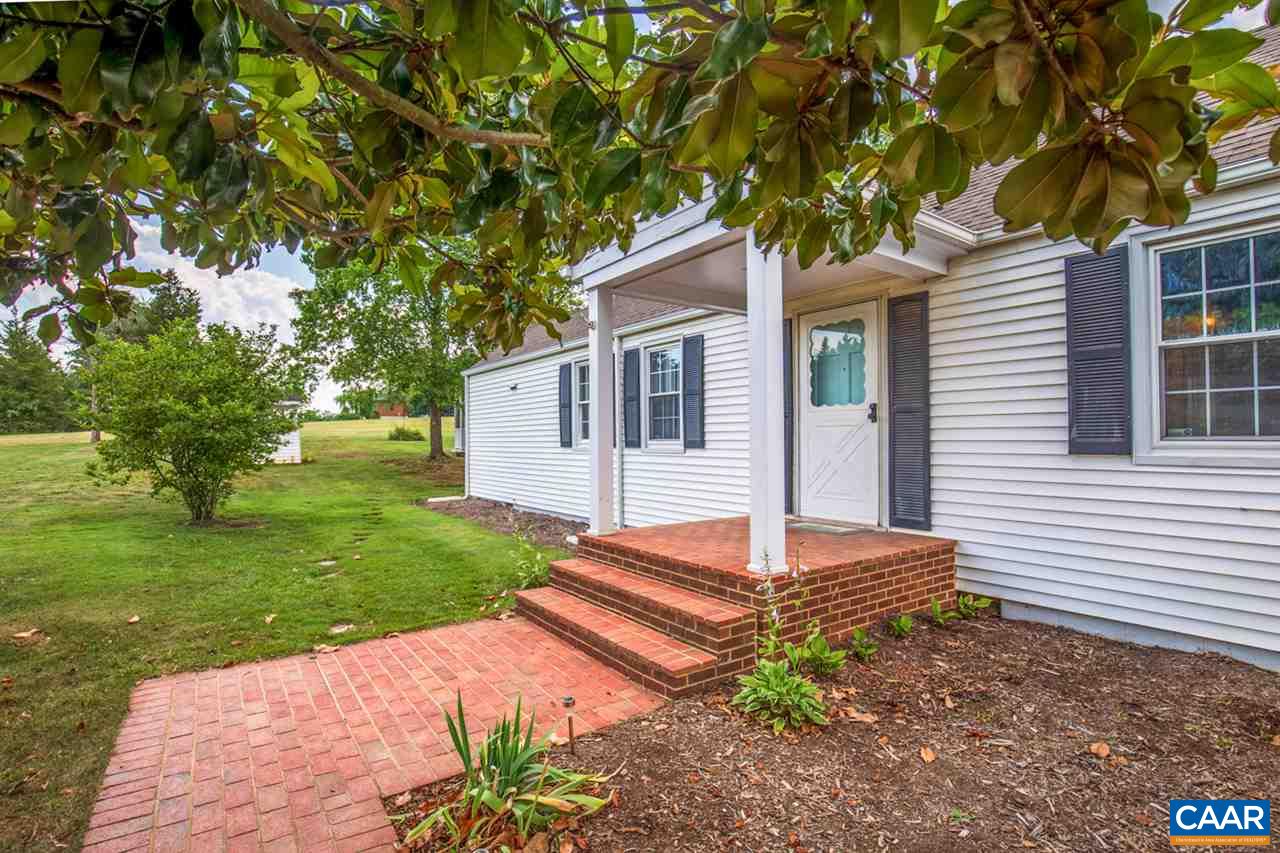 198 Keith Road Stanardsville, VA 22973 - Photo 13 of 49 a backyard of a house with seating space