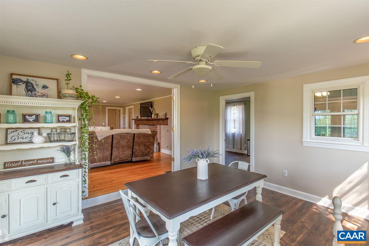 198 Keith Road Stanardsville, VA 22973 - Photo 24 of 49 a living room with stainless steel appliances kitchen island granite countertop furniture and a kitchen view