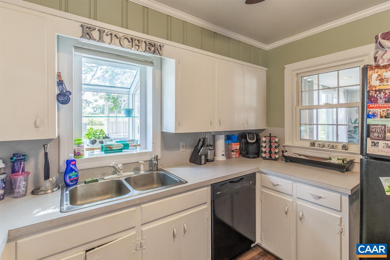 198 Keith Road Stanardsville, VA 22973 - Photo 30 of 49 a kitchen with a sink cabinets and window
