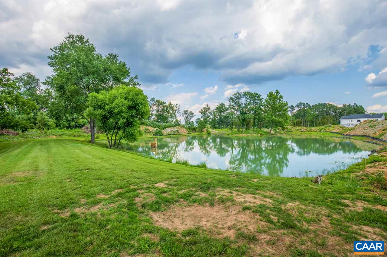198 Keith Road Stanardsville, VA 22973 - Photo 3 of 49 a view of a lake with a big yard