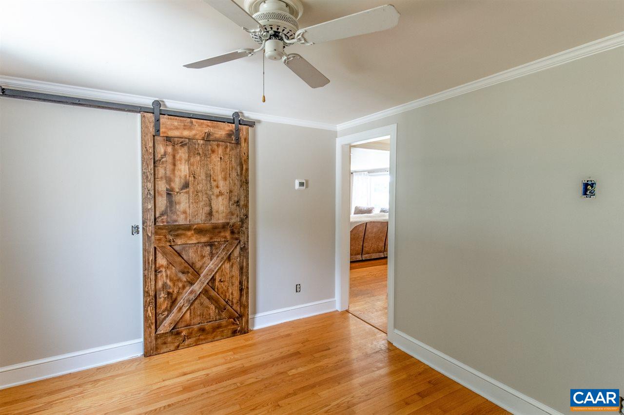 198 Keith Road Stanardsville, VA 22973 - Photo 36 of 49 wooden floor in an empty room with a window