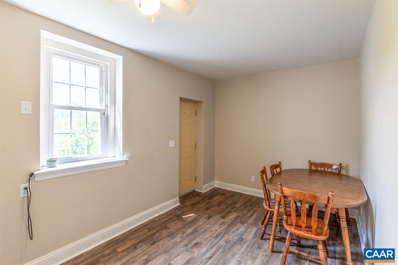 198 Keith Road Stanardsville, VA 22973 - Photo 39 of 49 a view of a dining room with furniture and wooden floor