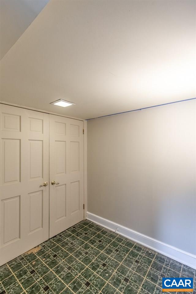 198 Keith Road Stanardsville, VA 22973 - Photo 46 of 49 an empty room with a workbench