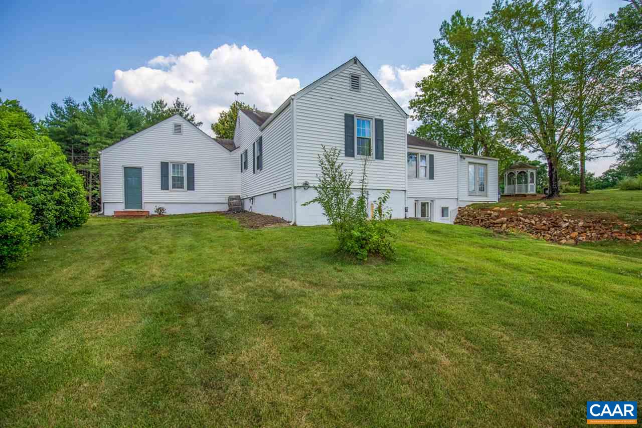 198 Keith Road Stanardsville, VA 22973 - Photo 48 of 49 a front view of house with yard and trees