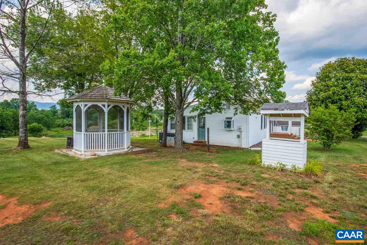 198 Keith Road Stanardsville, VA 22973 - Photo 5 of 49 a front view of a house with a garden