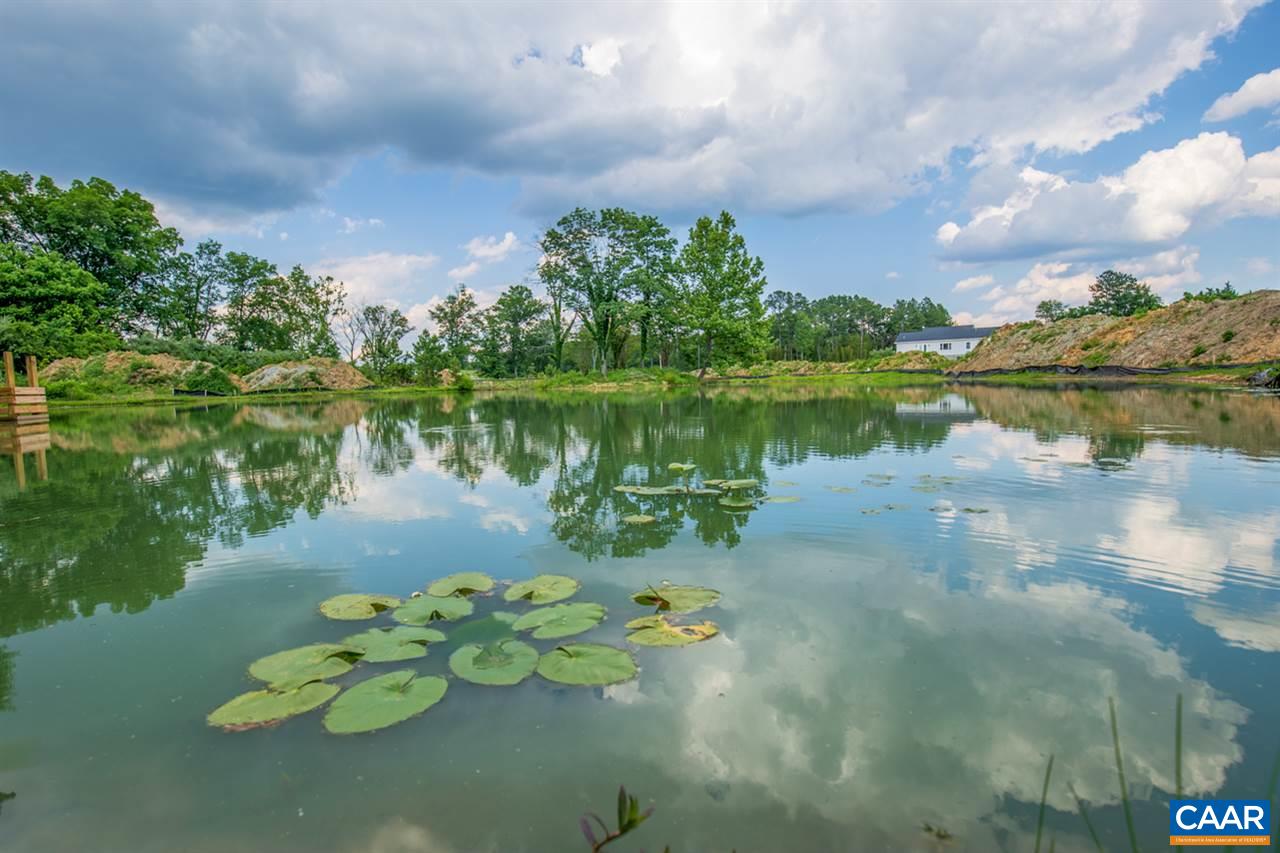 198 Keith Road Stanardsville, VA 22973 - Photo 6 of 49 a view of a lake with a yard